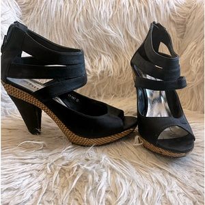 Bucco black heels